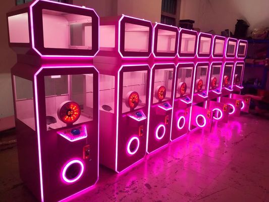 동전에 의하여 운영하는 분홍색 선물 자동 판매기 아케이드 게임 캡슐 장난감 복권 장비